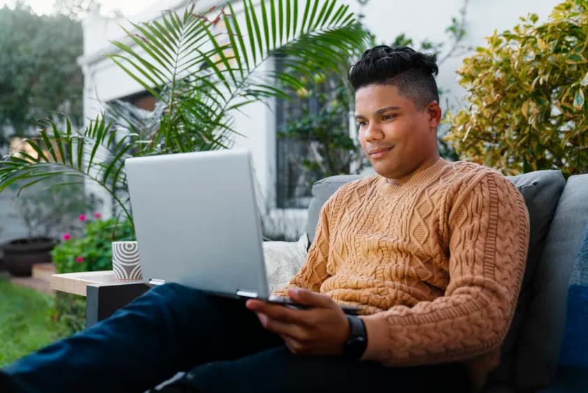 Student learning on a laptop